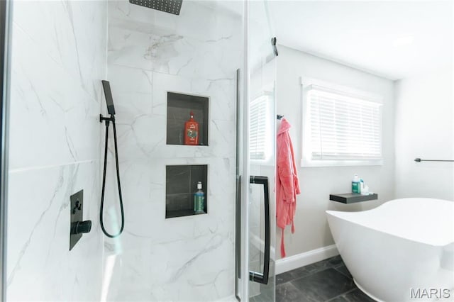10605 Larson Ln, Rolla, MO 65401 - bathroom featuring a marble finish shower, baseboards, and a soaking tub