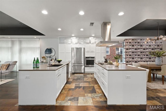 4545 Lindell Blvd Unit 3, Saint Louis, MO 63108 - kitchen with stainless steel appliances, a center island with sink, island exhaust hood, a sink, and recessed lighting