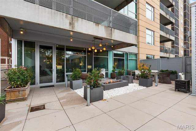 4545 Lindell Blvd Unit 3, Saint Louis, MO 63108 - view of patio / terrace featuring a fire pit