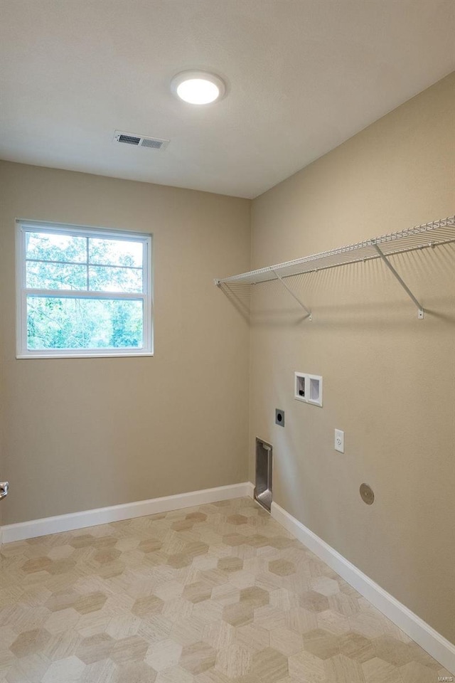 1461 Lexi Ln, Mascoutah, IL 62258 - laundry room featuring electric dryer hookup, washer hookup, and baseboards