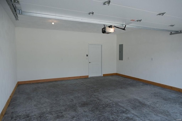 1461 Lexi Ln, Mascoutah, IL 62258 - garage featuring a garage door opener, electric panel, and baseboards