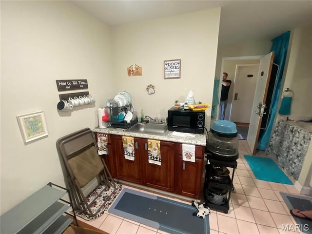 1 Proactive Dr, New Florence, MO 63363 - bar with black microwave, light tile patterned floors, and a sink