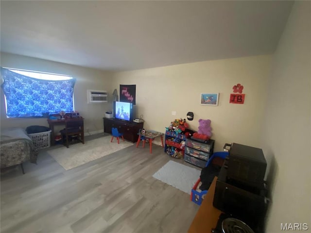 1 Proactive Dr, New Florence, MO 63363 - living room featuring wood finished floors and a wall unit AC