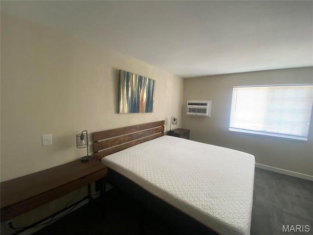 1 Proactive Dr, New Florence, MO 63363 - bedroom with a wall mounted air conditioner, dark colored carpet, and baseboards