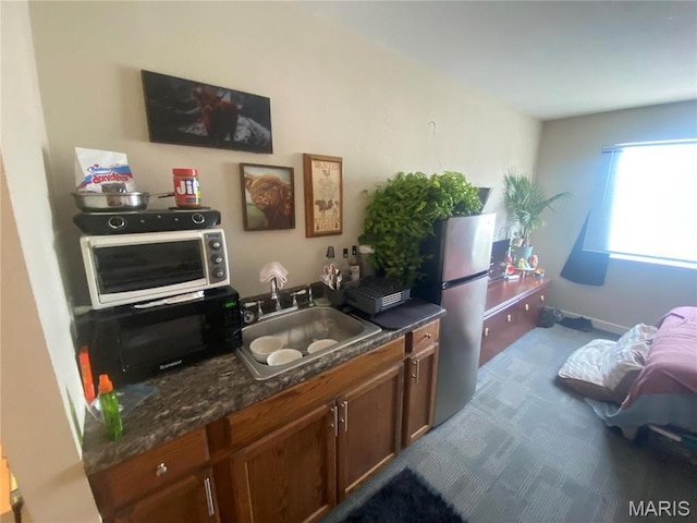 1 Proactive Dr, New Florence, MO 63363 - bar area with appliances with stainless steel finishes, a sink, and dark carpet
