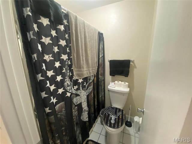 1 Proactive Dr, New Florence, MO 63363 - full bath featuring tile patterned floors, toilet, and a shower with shower curtain
