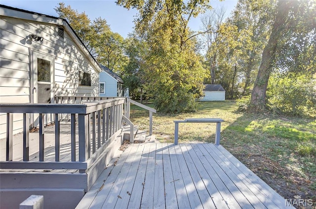 wooden deck with a yard