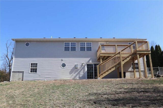19745 Sugar Ln, Waynesville, MO 65583 - back of property with stairway and a deck