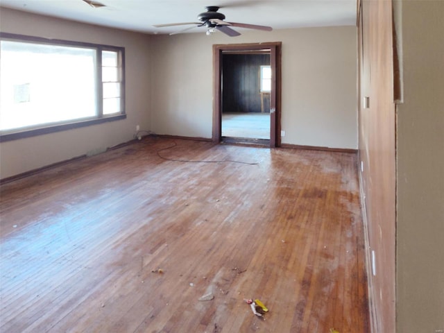2129 Red Bud Dr, Bonne Terre, MO 63628 - empty room featuring hardwood / wood-style flooring, ceiling fan, and baseboards