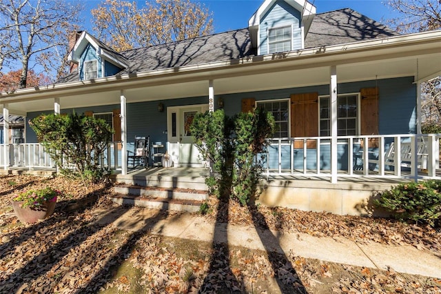 property entrance with covered porch