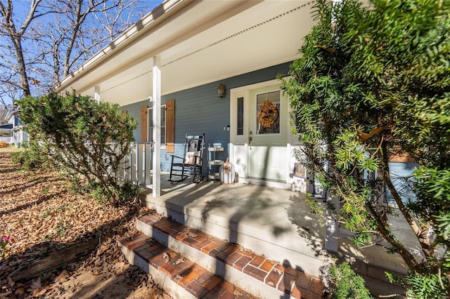entrance to property with a porch