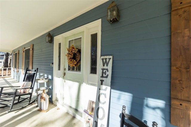 entrance to property with covered porch