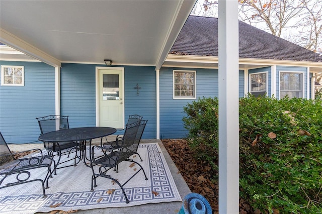 view of patio featuring outdoor dining area