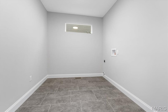laundry area featuring washer hookup, electric dryer hookup, and baseboards