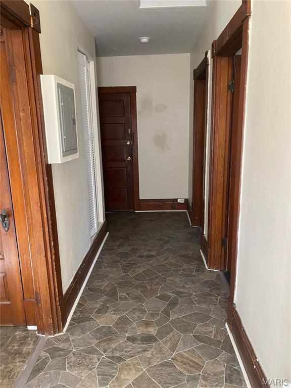 125 S 5th, Saint Charles, MO 63301 - hall with stone floors, electric panel, and baseboards