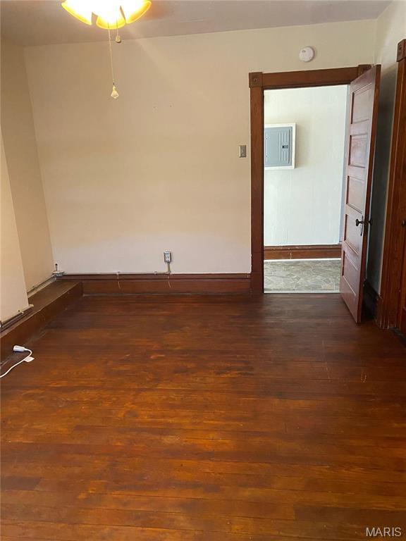 125 S 5th, Saint Charles, MO 63301 - unfurnished room with wood finished floors, baseboards, a smoke detector, a ceiling fan, and electric panel
