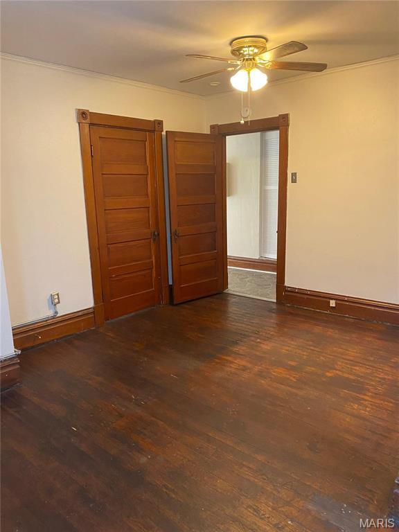 125 S 5th, Saint Charles, MO 63301 - unfurnished room featuring wood finished floors, a ceiling fan, ornamental molding, and baseboards