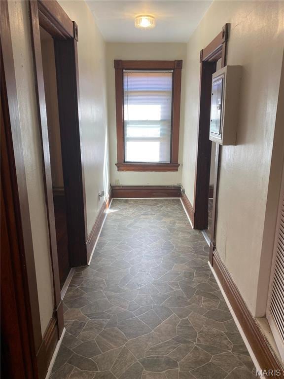 125 S 5th, Saint Charles, MO 63301 - hallway with stone flooring and baseboards