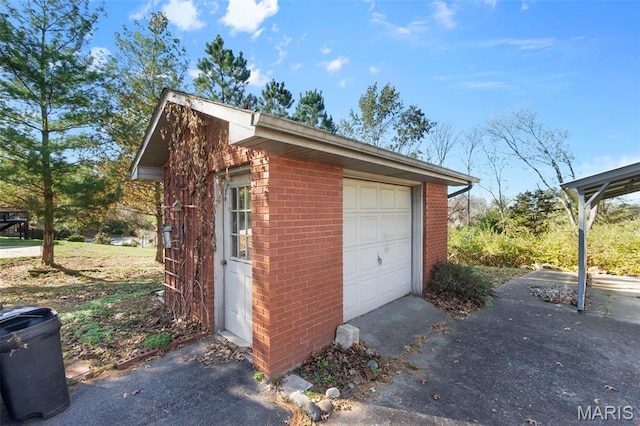 11 Schonhoff Cpe, Girardeau, MO 63703 - detached garage featuring driveway