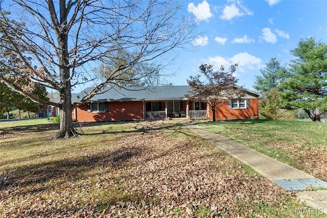 11 Schonhoff Cpe, Girardeau, MO 63703 - ranch-style house featuring covered porch and a front lawn