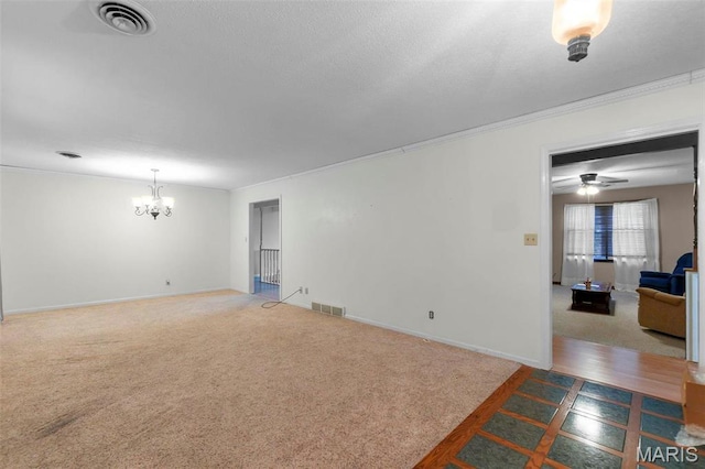 11 Schonhoff Cpe, Girardeau, MO 63703 - carpeted spare room featuring ornamental molding, a chandelier, and baseboards