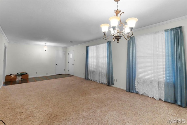 11 Schonhoff Cpe, Girardeau, MO 63703 - empty room featuring ornamental molding, a chandelier, carpet flooring, and baseboards