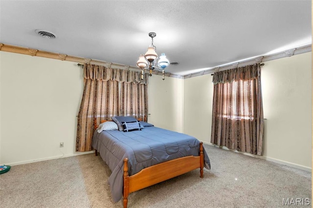 11 Schonhoff Cpe, Girardeau, MO 63703 - carpeted bedroom featuring a chandelier and baseboards