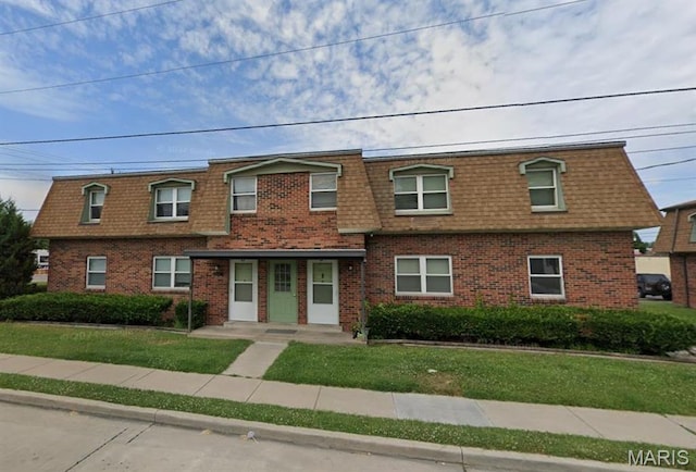 753 Rozier St, Saint Genevieve, MO 63670 - view of front of house featuring mansard roof and brick siding