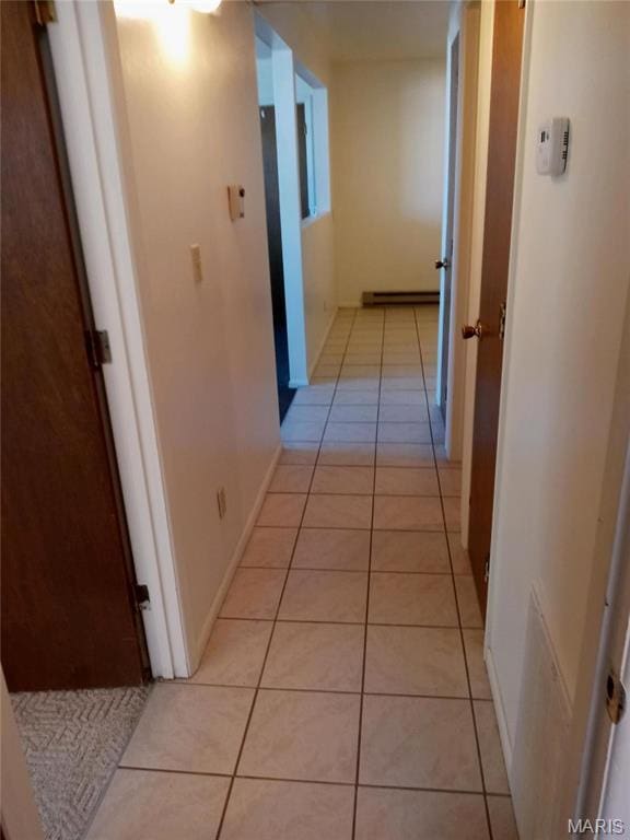 753 Rozier St, Saint Genevieve, MO 63670 - corridor featuring light tile patterned floors and baseboard heating