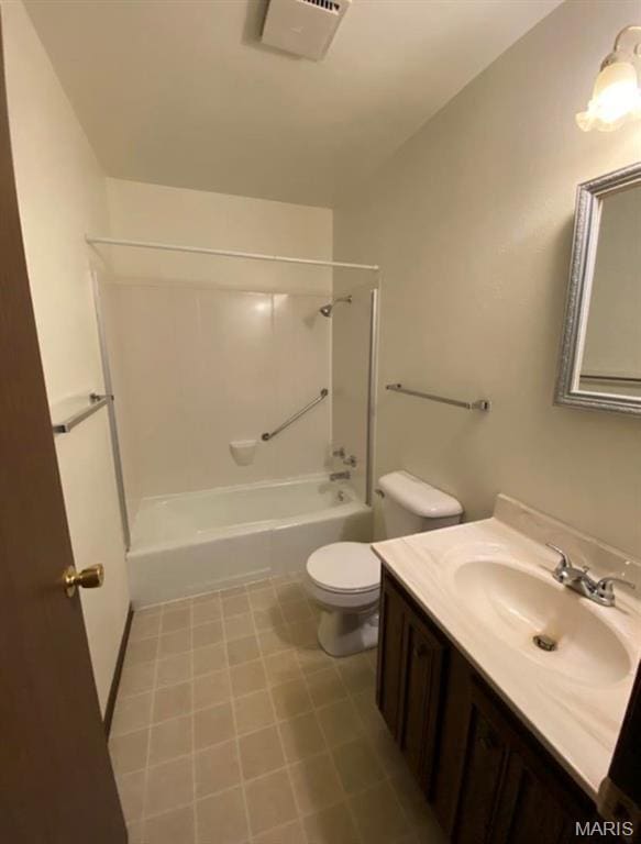 753 Rozier St, Saint Genevieve, MO 63670 - bathroom featuring vanity, washtub / shower combination, toilet, and tile patterned flooring