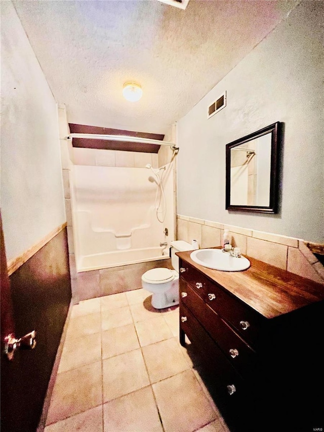 16144 Horse Shoe Dr, Houston, MO 65483 - bathroom with toilet, a textured ceiling, washtub / shower combination, tile patterned floors, and vanity