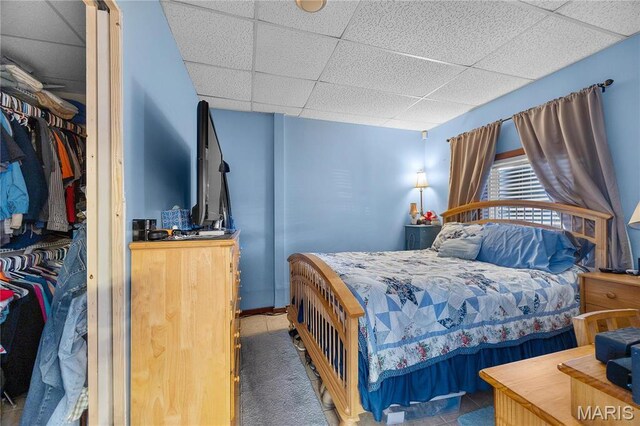 9136 Beach Dr, French Village, MO 63036 - bedroom featuring a drop ceiling and a closet