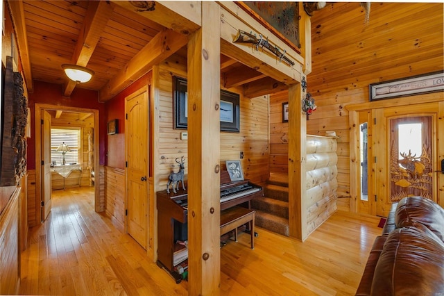 10450 Ok Rd, Bonne Terre, MO 63628 - corridor featuring wooden walls, light wood finished floors, wooden ceiling, and beamed ceiling
