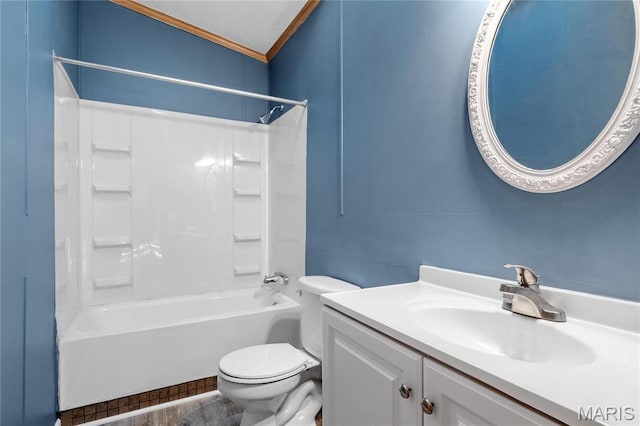 bathroom featuring ornamental molding, toilet,  shower combination, and vanity