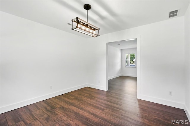 1 Germania, Columbia, IL 62236 - spare room with baseboards and dark wood-style floors