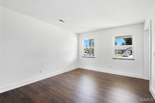 1 Germania, Columbia, IL 62236 - spare room featuring baseboards and dark wood finished floors