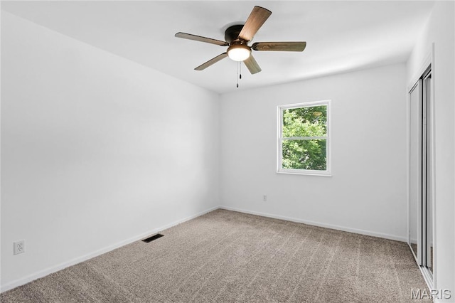 1 Germania, Columbia, IL 62236 - carpeted empty room featuring baseboards and a ceiling fan