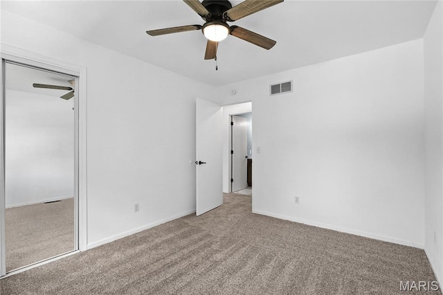 1 Germania, Columbia, IL 62236 - unfurnished bedroom featuring carpet flooring, a closet, and a ceiling fan