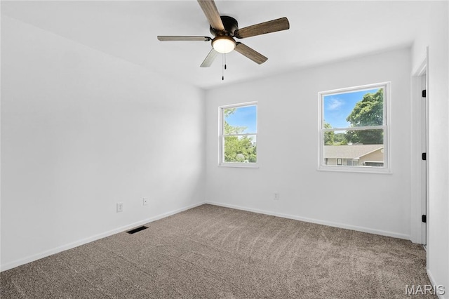 1 Germania, Columbia, IL 62236 - carpeted empty room featuring a ceiling fan and baseboards