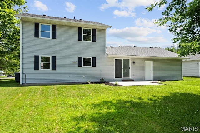 1 Germania, Columbia, IL 62236 - rear view of property with a patio, a lawn, and roof with shingles