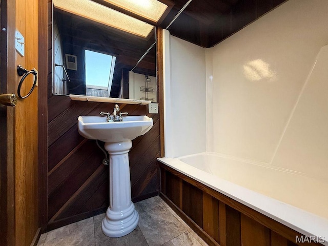 9454 Little Indian Creek Rd, Lonedell, MO 63060 - full bathroom featuring shower / bath combination and wood walls