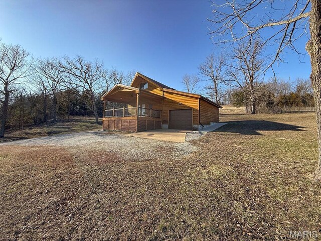 9454 Little Indian Creek Rd, Lonedell, MO 63060 - view of side of property featuring gravel driveway and a garage