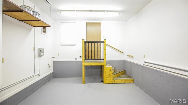 9454 Little Indian Creek Rd, Lonedell, MO 63060 - staircase with concrete floors and a baseboard heating unit