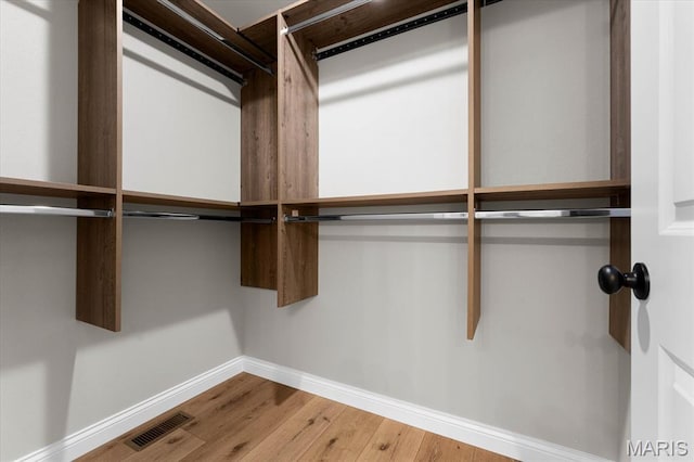 955 Half Moon Ln, Caseyville, IL 62232 - spacious closet featuring wood finished floors