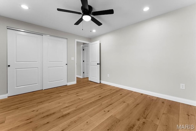 955 Half Moon Ln, Caseyville, IL 62232 - unfurnished bedroom with light wood-style flooring, a closet, recessed lighting, and ceiling fan