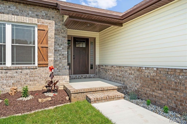 955 Half Moon Ln, Caseyville, IL 62232 - view of exterior entry featuring covered porch and brick siding