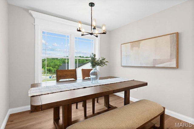 955 Half Moon Ln, Caseyville, IL 62232 - dining space featuring a chandelier and light wood-type flooring