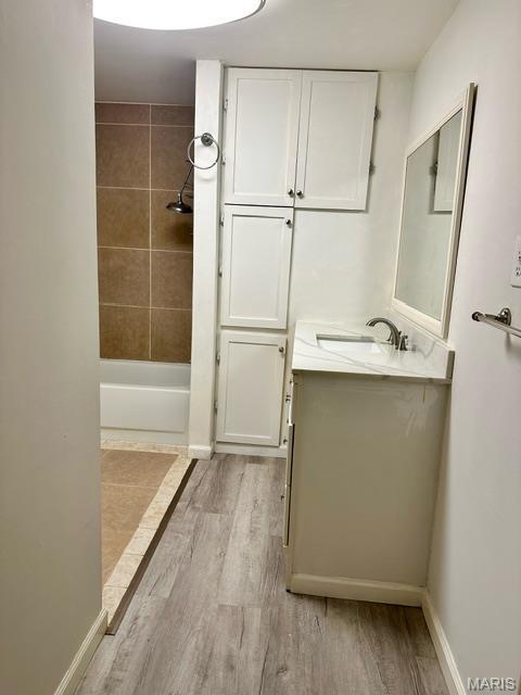 201 County Highway 331, Benton, MO 63736 - full bathroom featuring wood finished floors and vanity