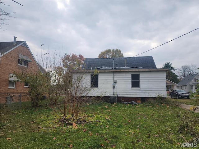 2365 E Converse Ave, Springfield, IL 62702 - rear view of property featuring a shingled roof