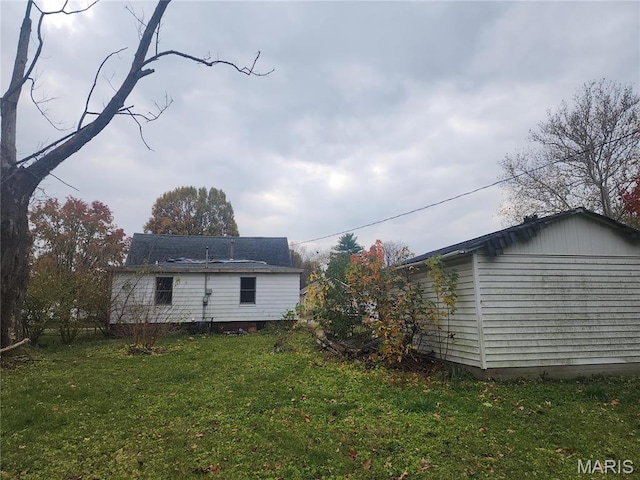 2365 E Converse Ave, Springfield, IL 62702 - rear view of property featuring a yard